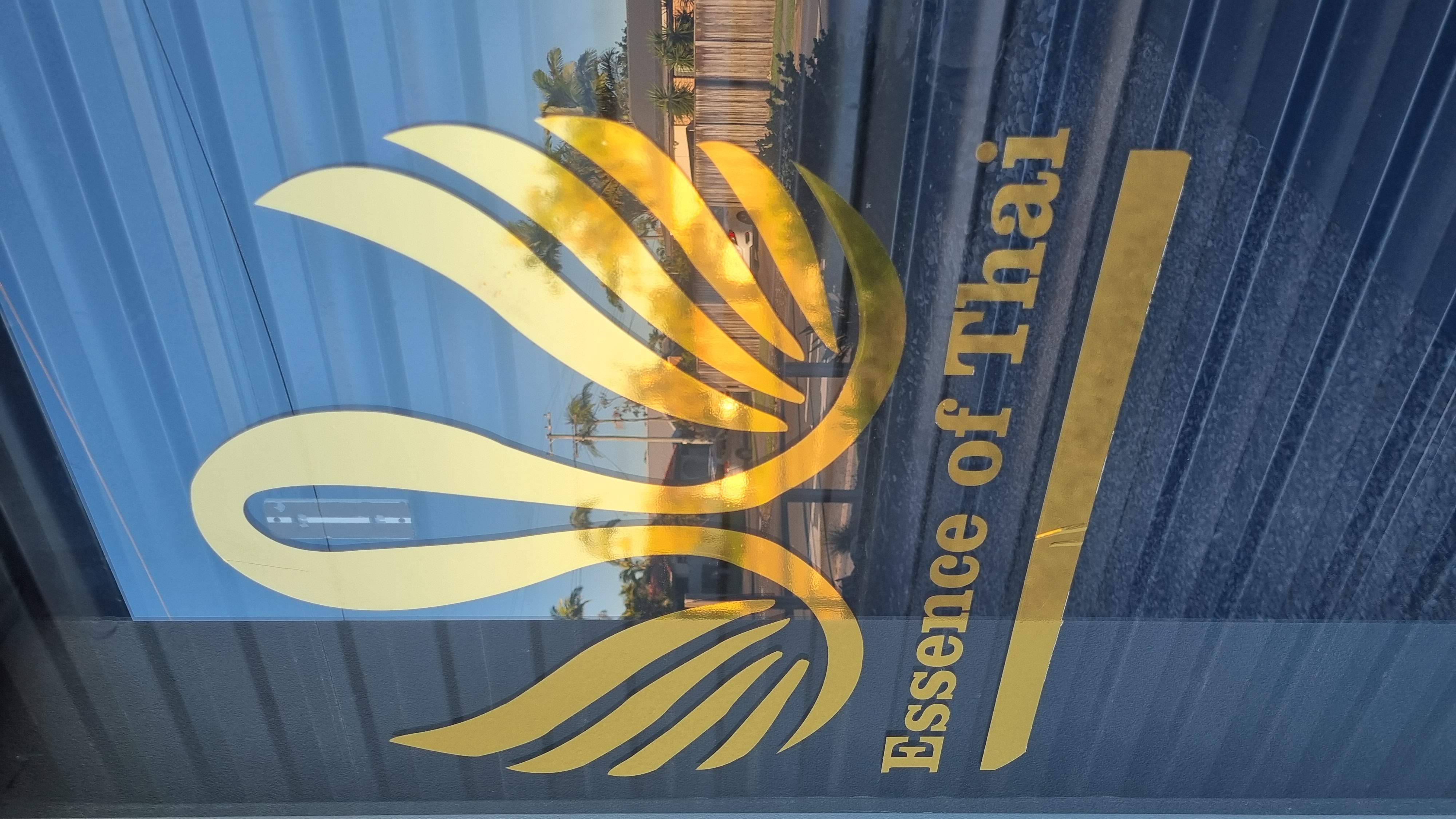 Full-colour printed window graphics transforming a Sunshine Coast shopfront